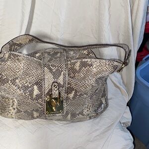 MICHEAL KORS,  this bag was very much enjoyed by my 95-year-old meticulous mothe
